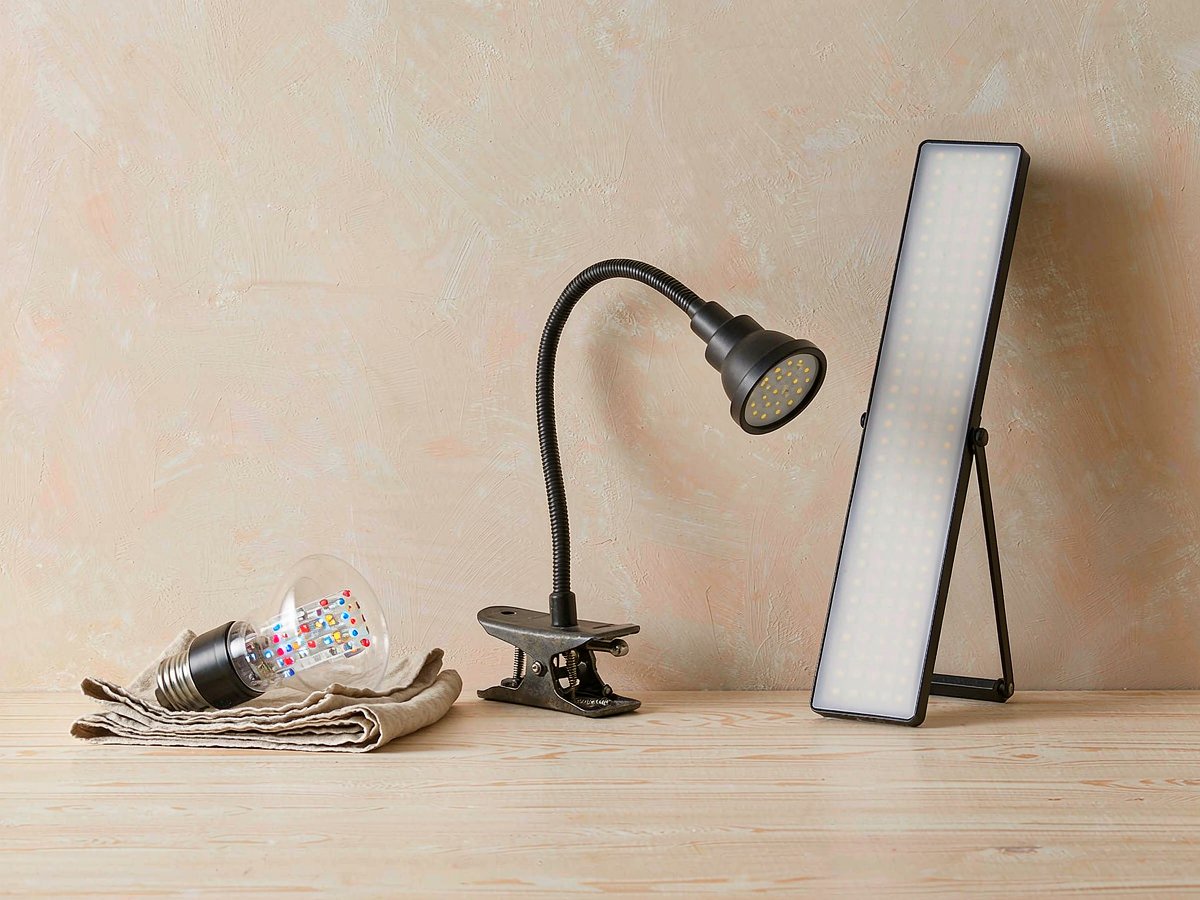 Three grow light types side by side: an E26 LED grow bulb, a clip-on gooseneck lamp, and a slim LED panel